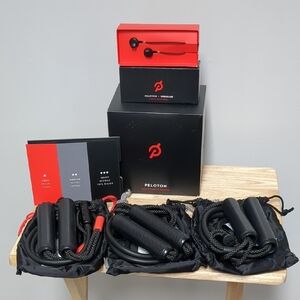 Peloton Black and Red Resistance Band Set Plus Pelotón Headphones.